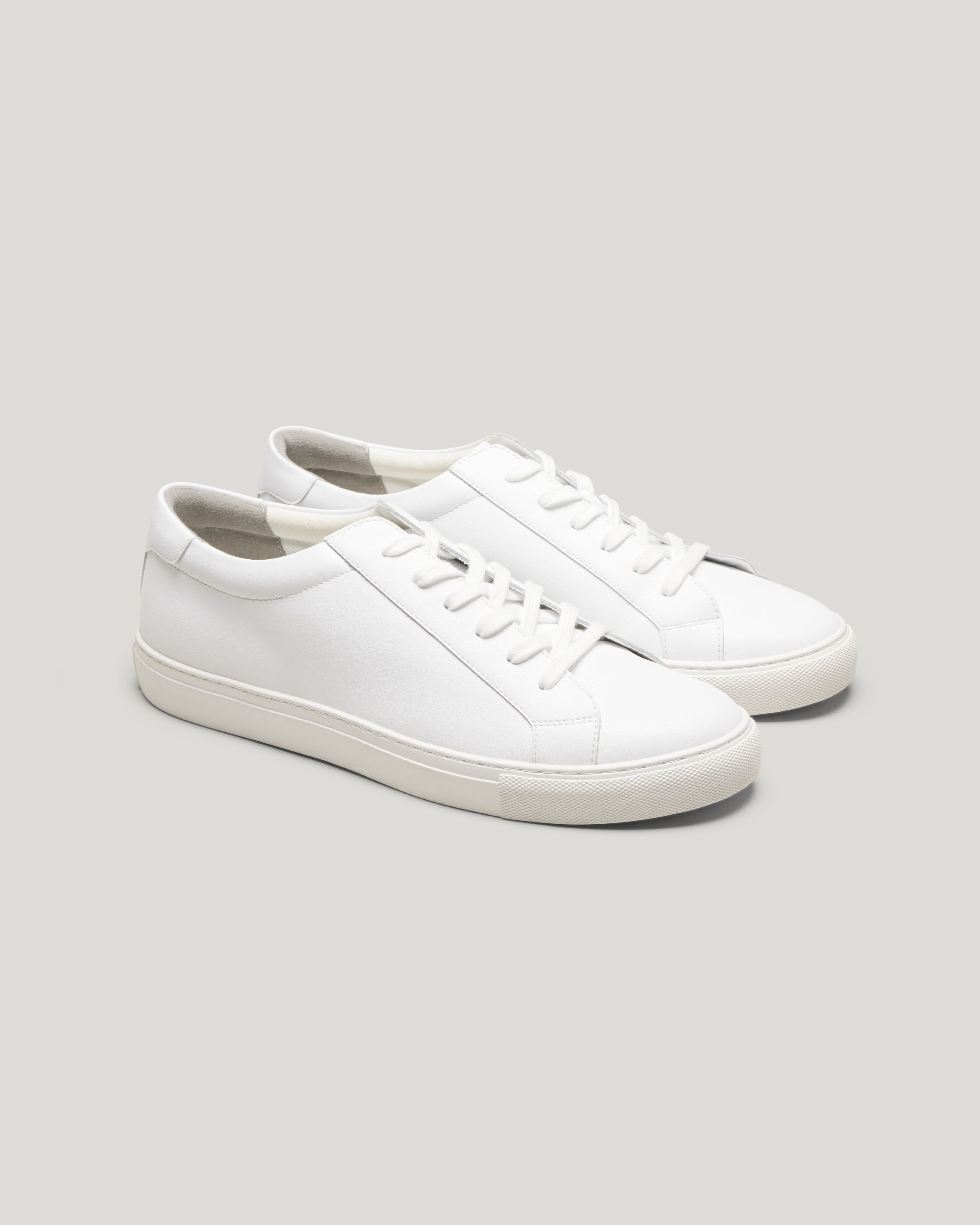 White leather athletic shoes hot sale